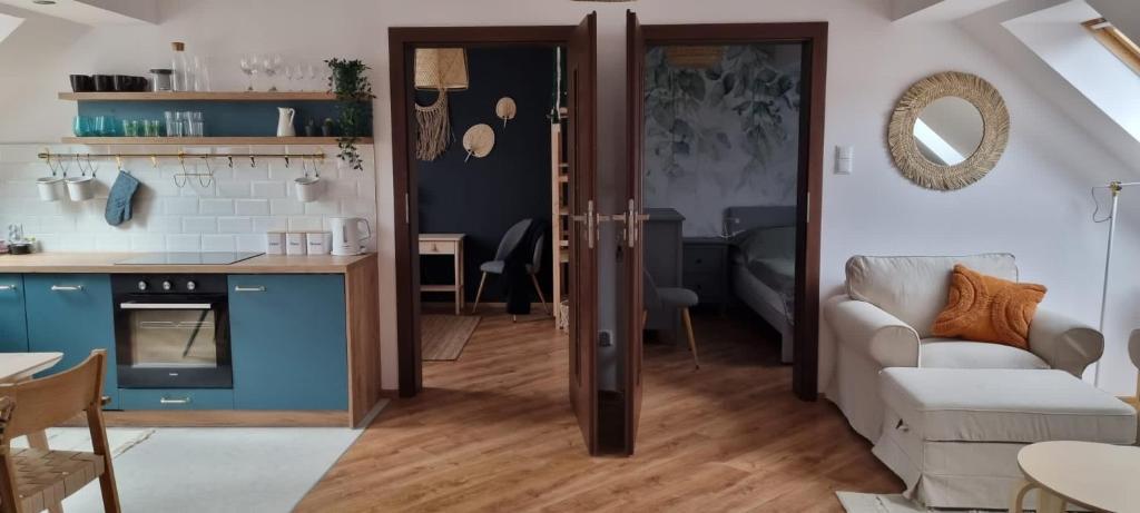 Kuchyňa alebo kuchynka v ubytovaní Apartament w centrum - Nasze poddasze