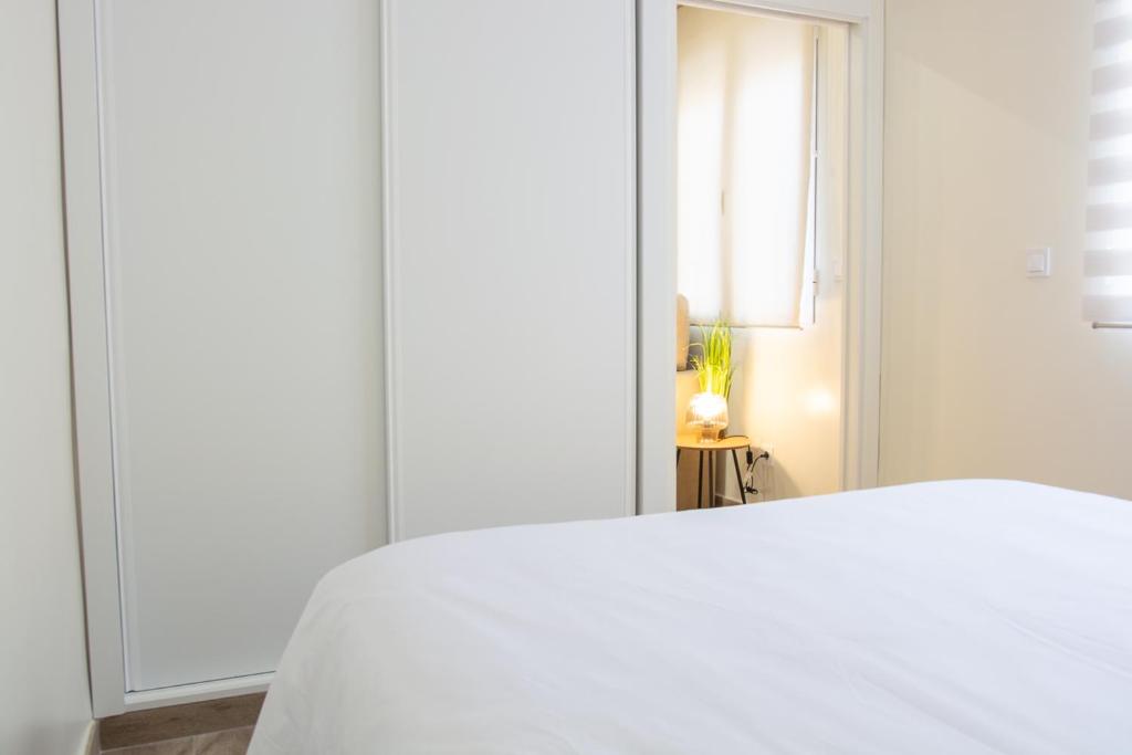Postel nebo postele na pokoji v ubytování AP HOTEL NAVAS