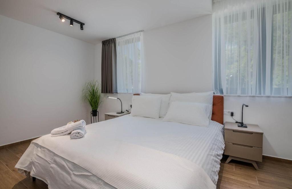 Łóżko lub łóżka w pokoju w obiekcie 270 Panorama Kvarner