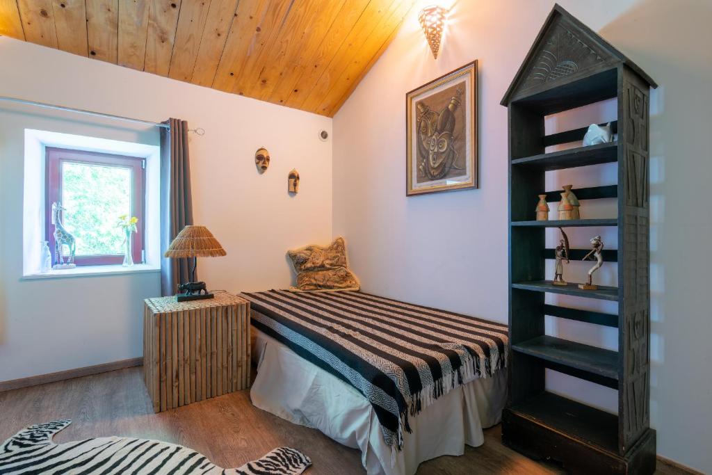 Postel nebo postele na pokoji v ubytování LE VIEUX NAYEU