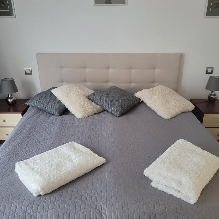 Uma cama ou camas num quarto em Penzion Sadová 471 u Znojma