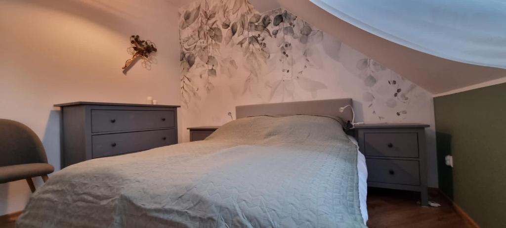 Posteľ alebo postele v izbe v ubytovaní Apartament w centrum - Nasze poddasze