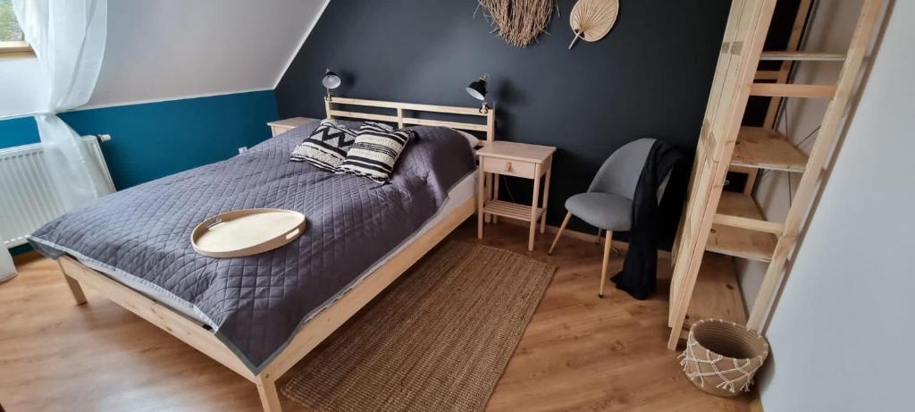 Posteľ alebo postele v izbe v ubytovaní Apartament w centrum - Nasze poddasze