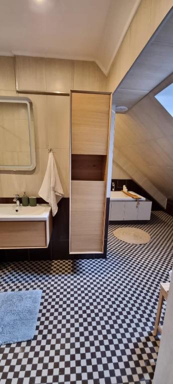 Posteľ alebo postele v izbe v ubytovaní Apartament w centrum - Nasze poddasze