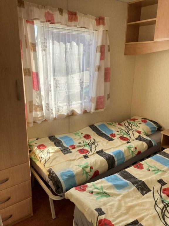 Postel nebo postele na pokoji v ubytování U Herolda