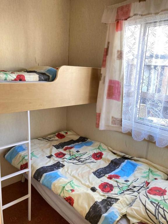 Postel nebo postele na pokoji v ubytování U Herolda