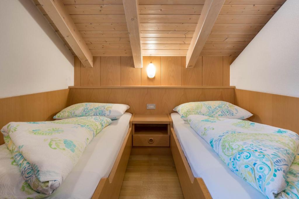 Postel nebo postele na pokoji v ubytování App Sonne Nr 20