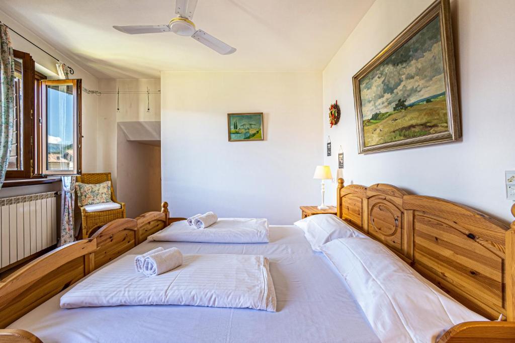 A bed or beds in a room at Appartment Capri