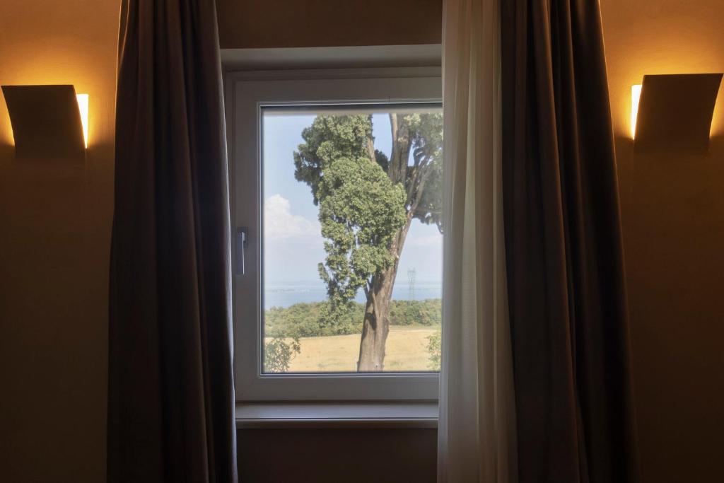 Fotografie z fotogalerie ubytování Eremus Relais v destinaci Lonato