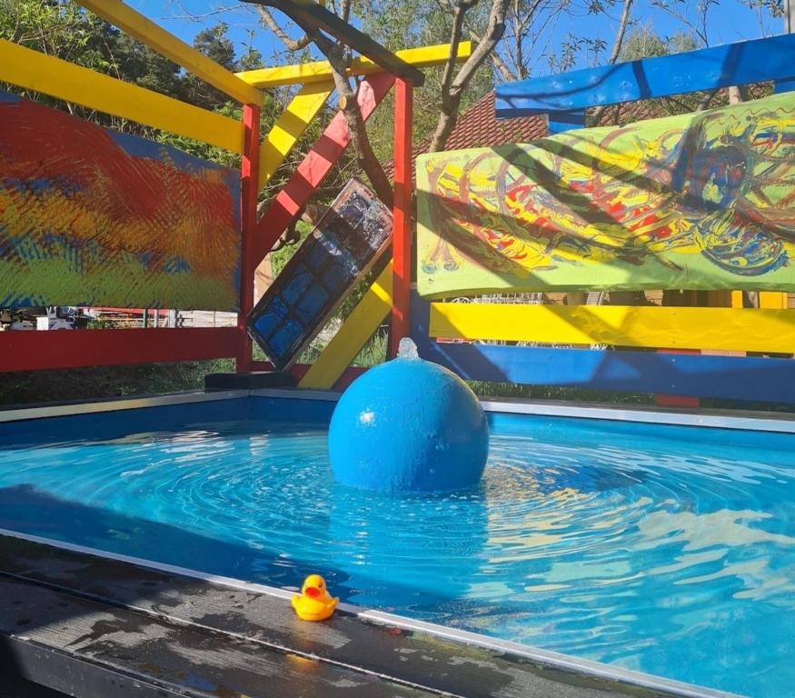 The swimming pool at or close to Tiny House Carlos