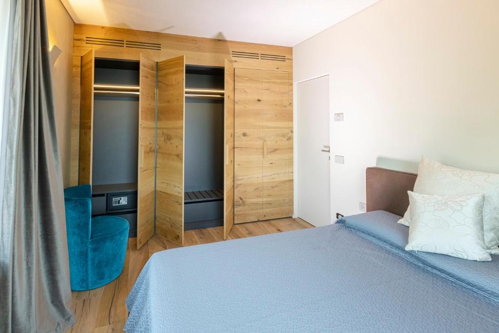 Postel nebo postele na pokoji v ubytování Eremus Relais