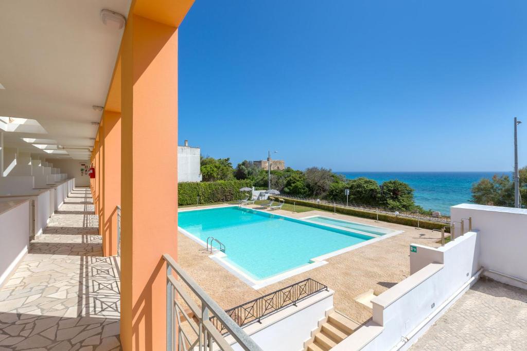Bazén v ubytování Residence Solaris nebo v jeho okolí