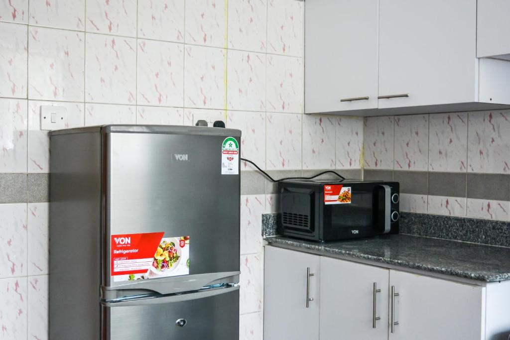Kuchyň nebo kuchyňský kout v ubytování Brickwood Apartments