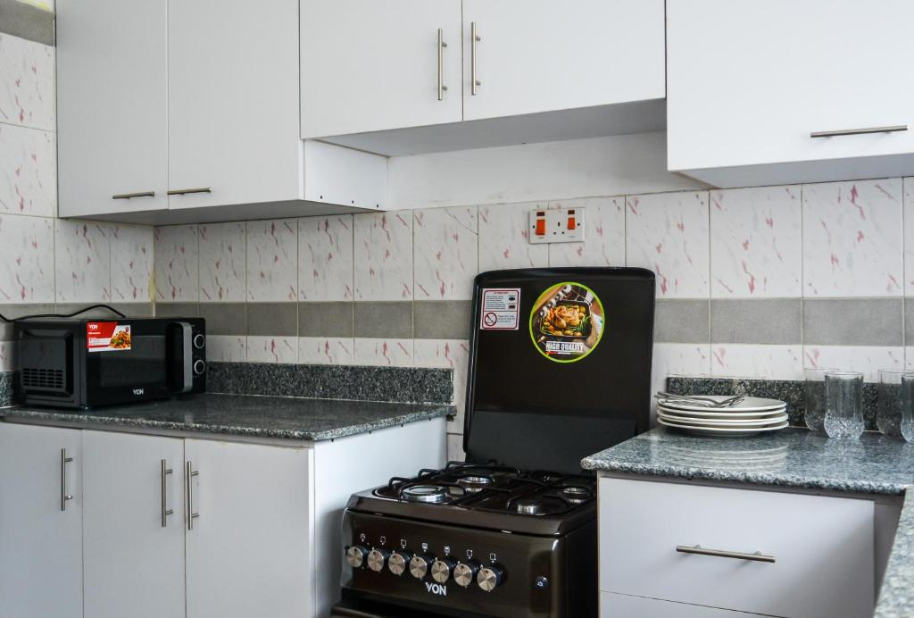 Kuchyň nebo kuchyňský kout v ubytování Brickwood Apartments