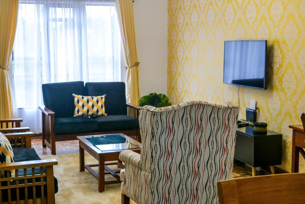TV a/nebo společenská místnost v ubytování Brickwood Apartments