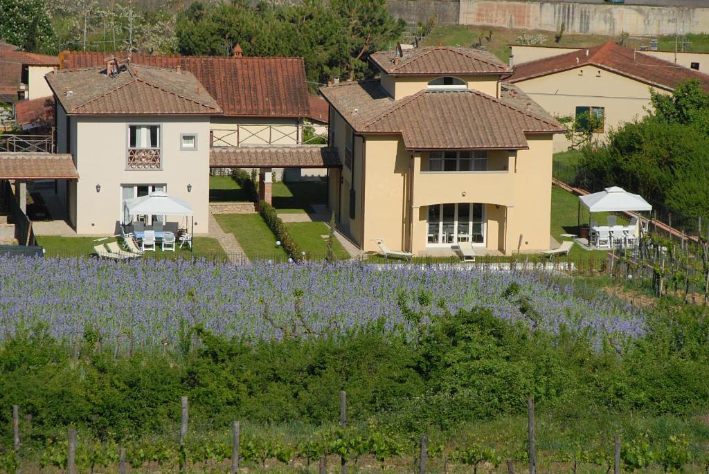 Vonkajšia záhrada v ubytovaní Residenza Le Grillaie
