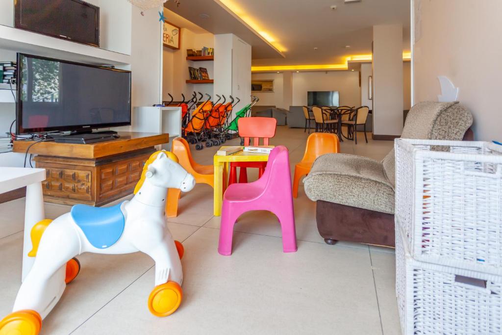 TV a/nebo společenská místnost v ubytování Hotel Oceanic
