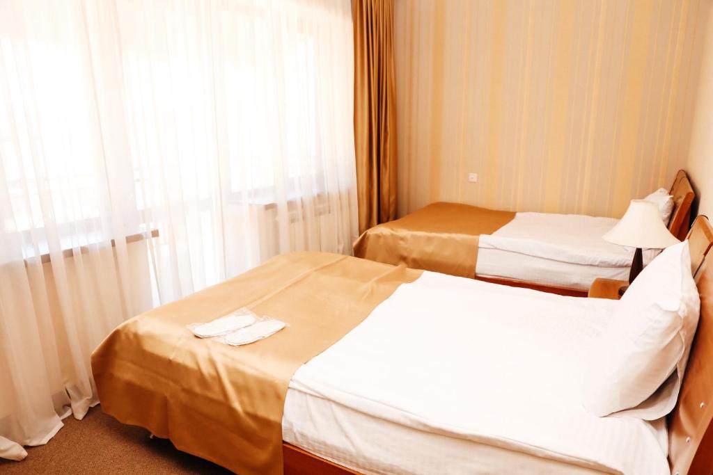 Postel nebo postele na pokoji v ubytování Best Western Bohemian Resort