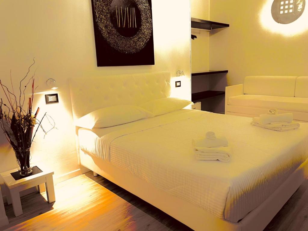 Posteľ alebo postele v izbe v ubytovaní Hotel Okinawa