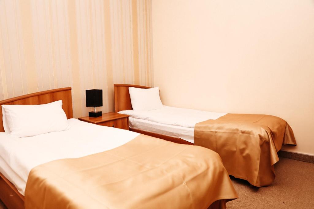 Postel nebo postele na pokoji v ubytování Best Western Bohemian Resort