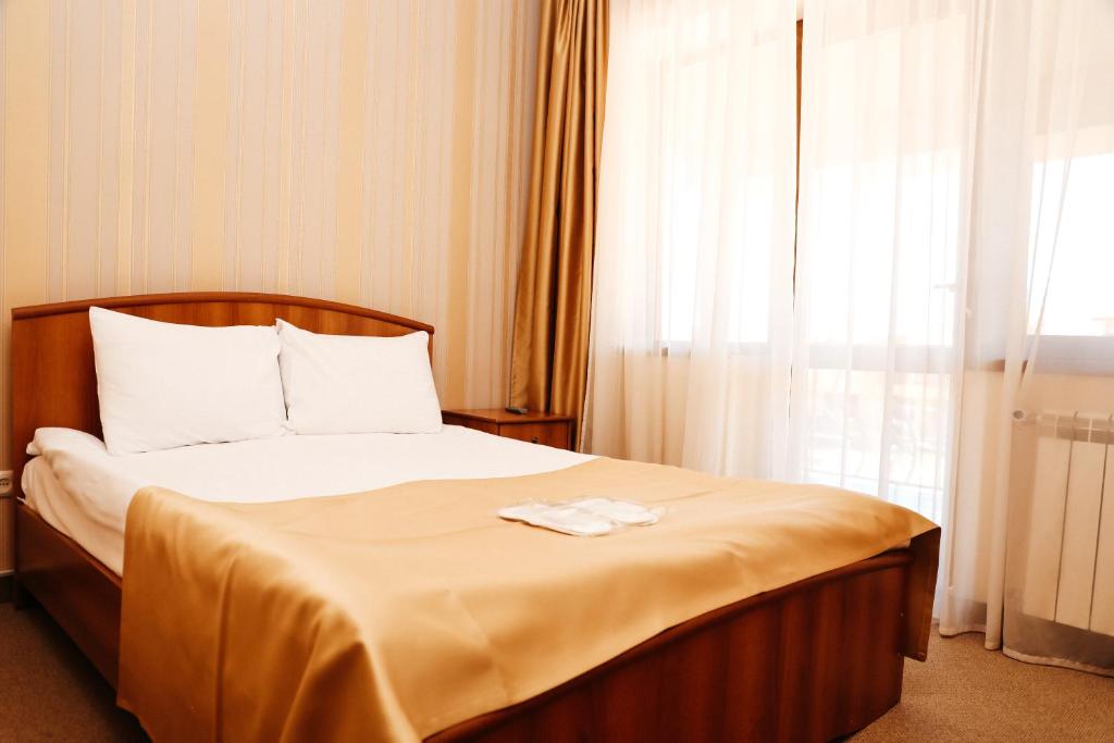 Postel nebo postele na pokoji v ubytování Best Western Bohemian Resort