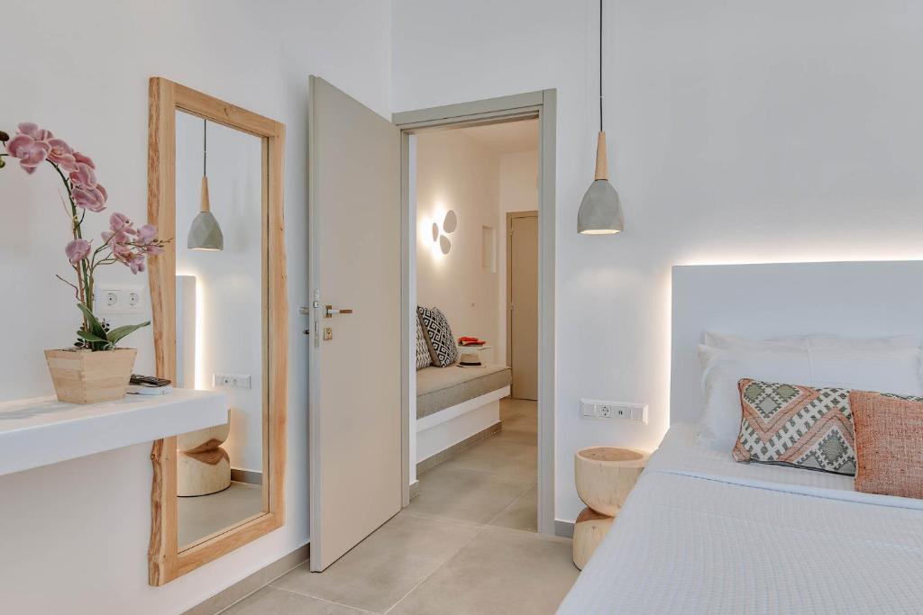 Postel nebo postele na pokoji v ubytování Nautica suites - Grand Suite with jacuzzi