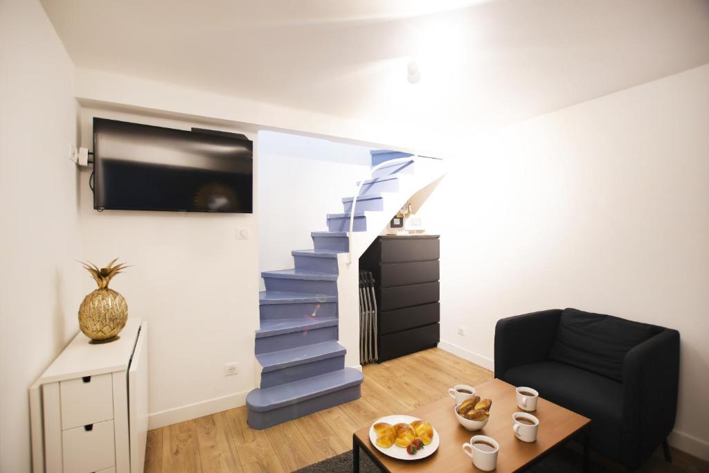 Posedenie v ubytovaní Bel appartement idéalement situé - Tour Eiffel