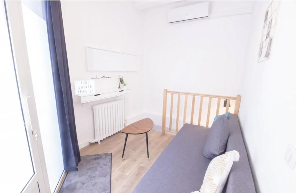Posteľ alebo postele v izbe v ubytovaní Bel appartement idéalement situé - Tour Eiffel