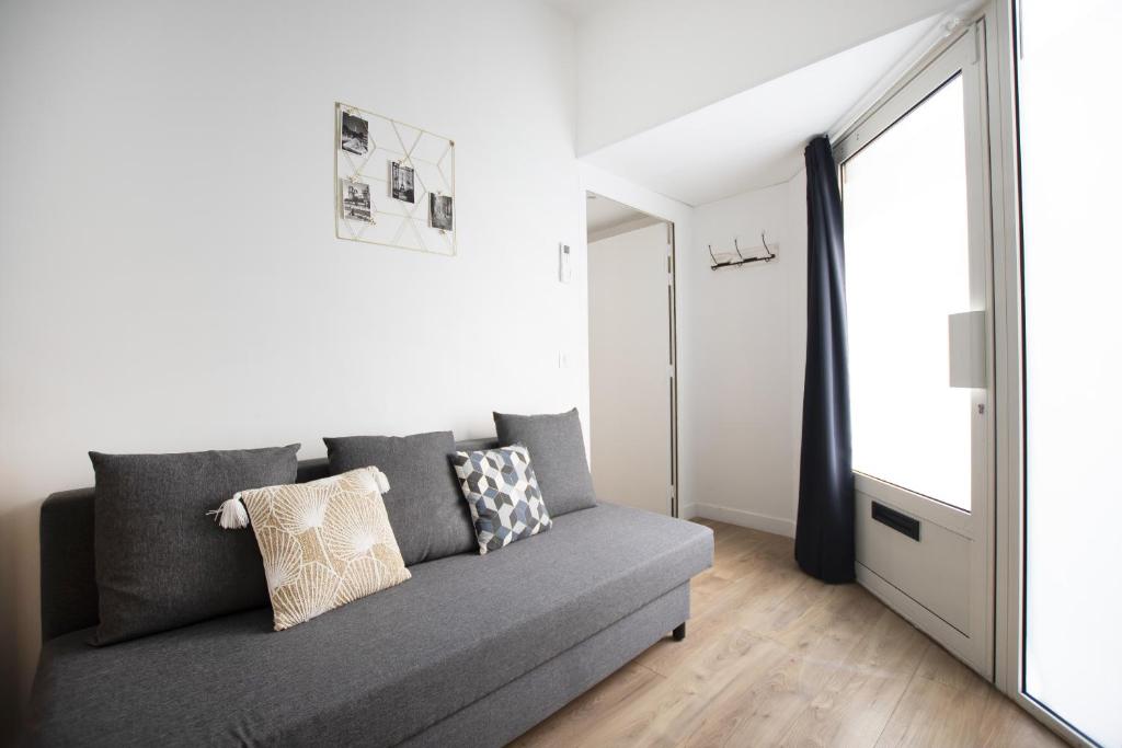 Posedenie v ubytovaní Bel appartement idéalement situé - Tour Eiffel