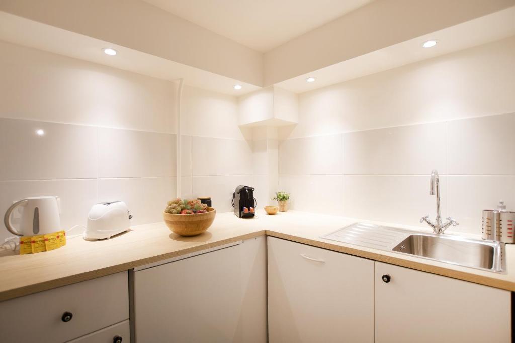 Kuchyňa alebo kuchynka v ubytovaní Bel appartement idéalement situé - Tour Eiffel