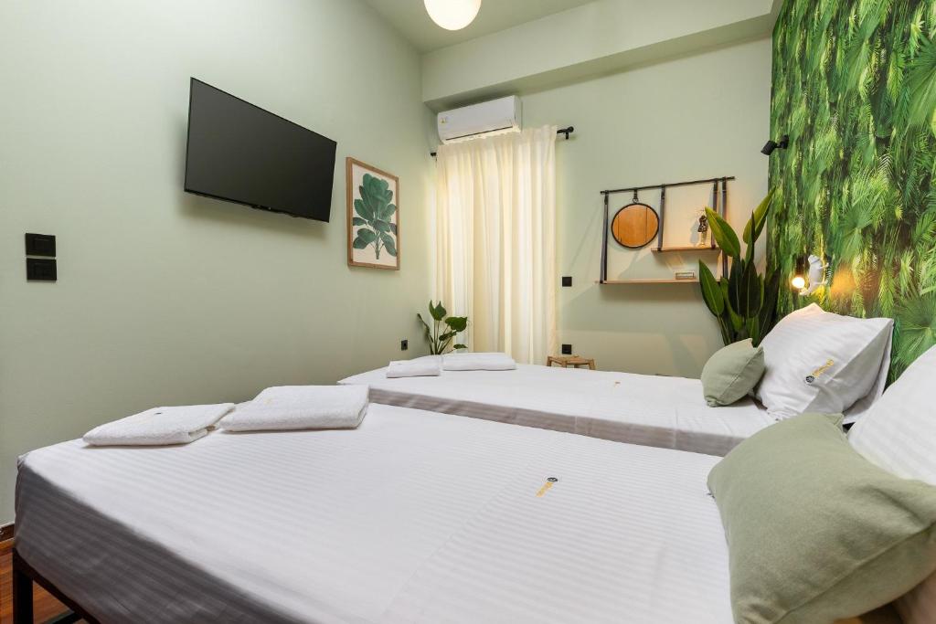 Postel nebo postele na pokoji v ubytování Mimosa Urban Habitation
