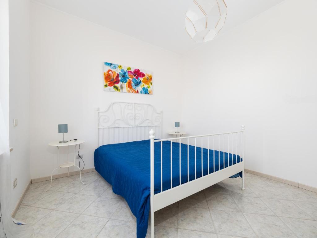 Łóżko lub łóżka w pokoju w obiekcie YourHome - Corso Italia Apt in Sorrento
