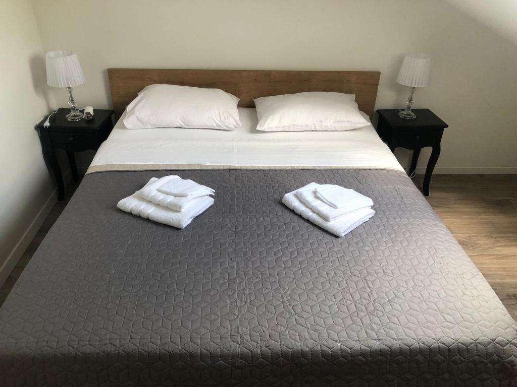 Posteľ alebo postele v izbe v ubytovaní Apartment CENTRO