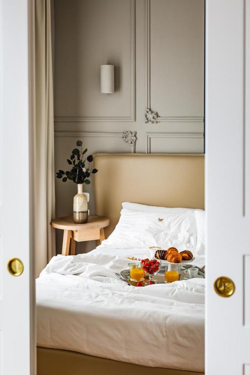Postel nebo postele na pokoji v ubytování SeeBay Hotel