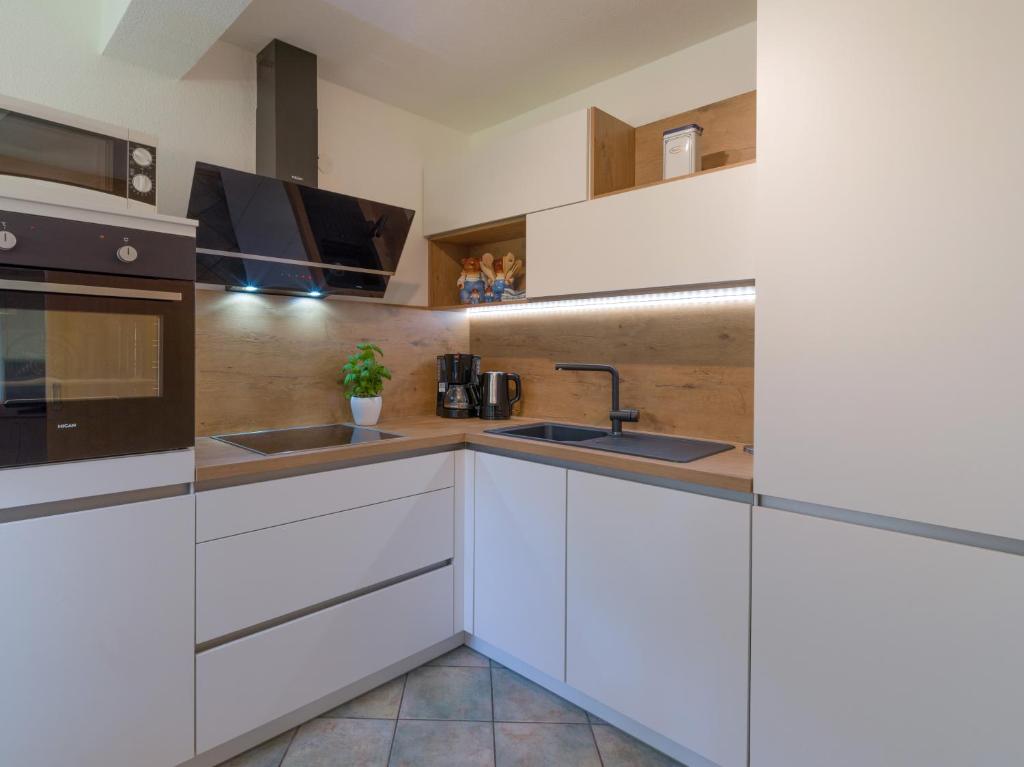Kuchyň nebo kuchyňský kout v ubytování Ferienwohnung Biechl