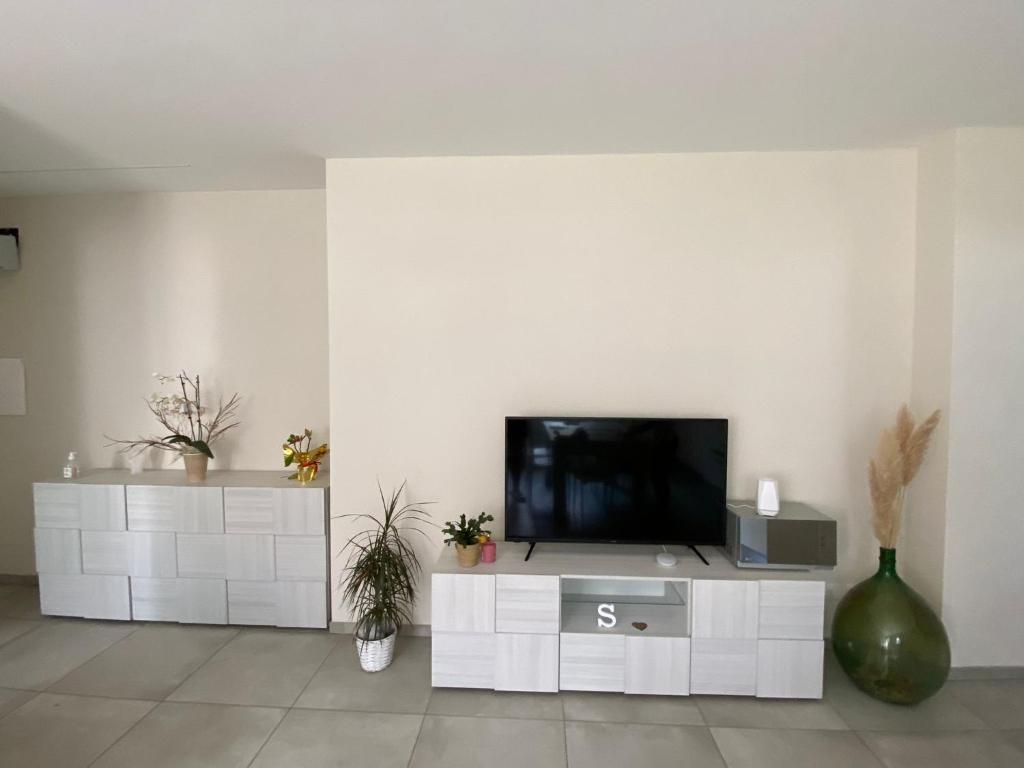 TV a/nebo společenská místnost v ubytování Casa Martina