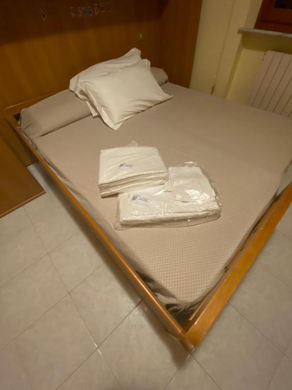 A bed or beds in a room at IL NIDO DI RONDINE