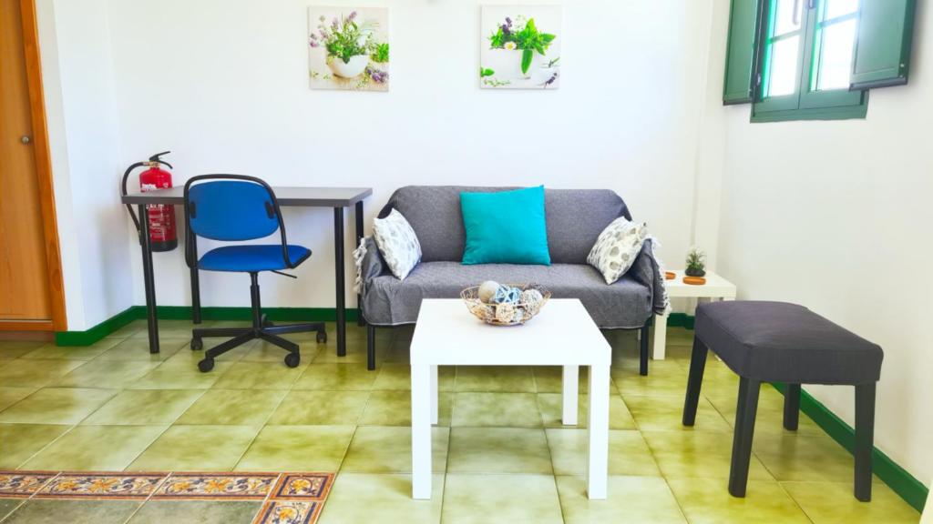 A seating area at Ílios de Mogán