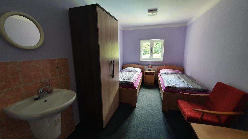 Postel nebo postele na pokoji v ubytování Chata Na Čiháku