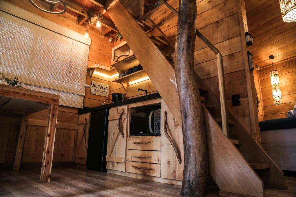 TV a/nebo společenská místnost v ubytování Casa na Árvore Morada dos Vagalumes