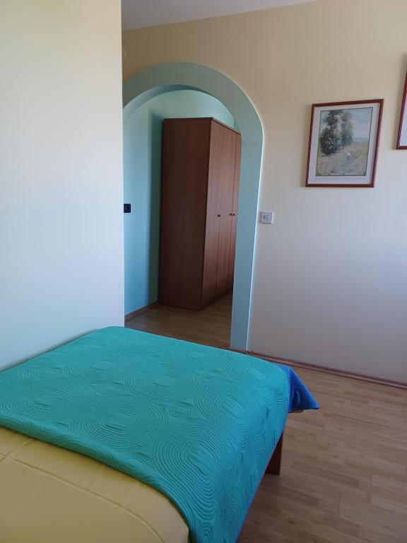 Postel nebo postele na pokoji v ubytování Apartman Alen