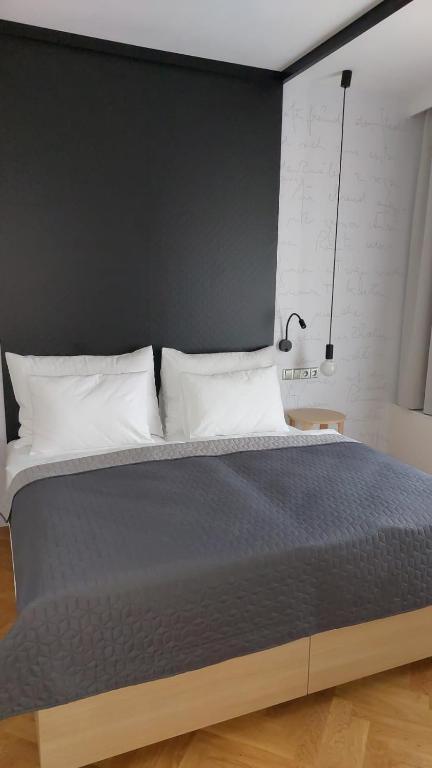 Postel nebo postele na pokoji v ubytování Zámek Třešť