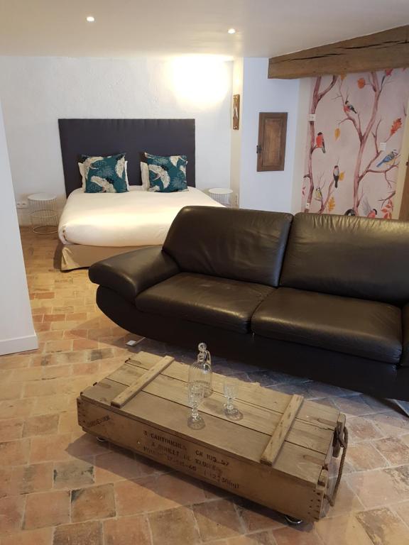 Χώρος καθιστικού στο Le Relais des Roses- Sauna, Chambres d'hôtes, Gîte