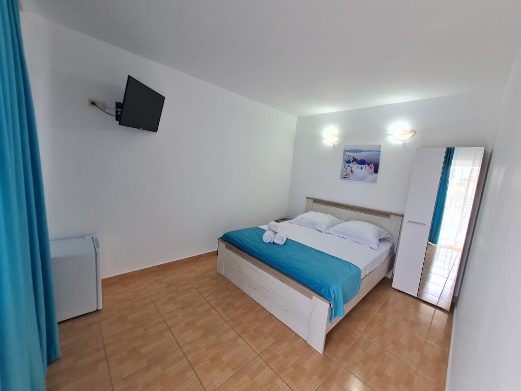 Postel nebo postele na pokoji v ubytování Casa Nicola