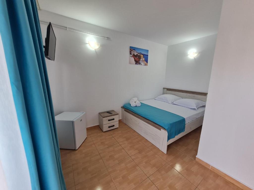 Postel nebo postele na pokoji v ubytování Casa Nicola