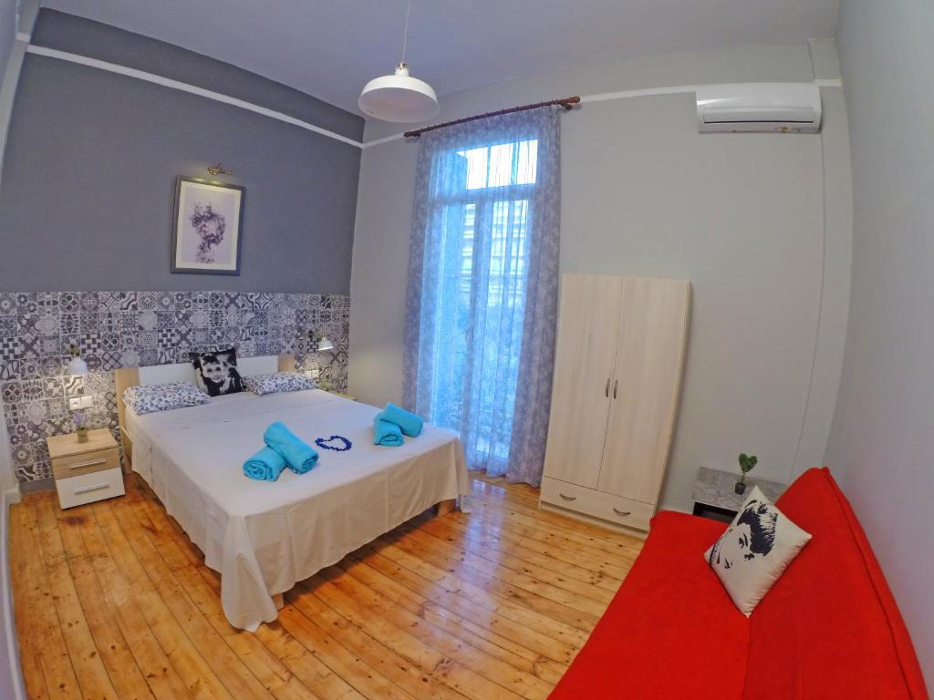 Posteľ alebo postele v izbe v ubytovaní Antigonidon Skyline View Penthouse