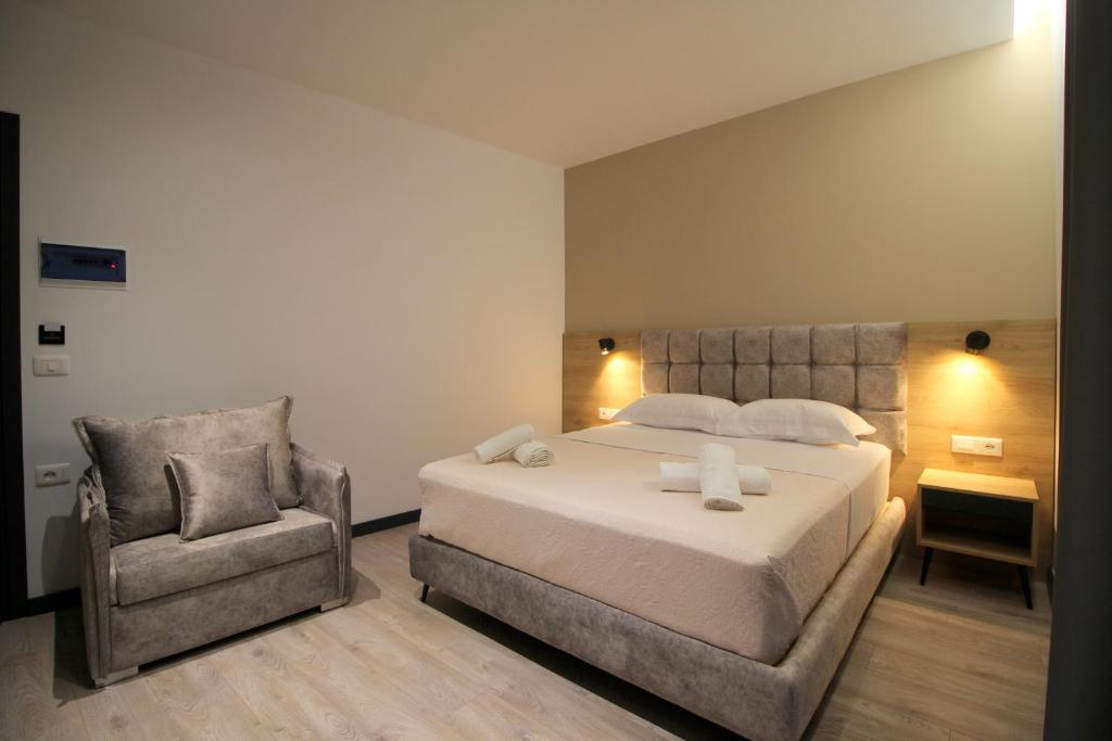 Postel nebo postele na pokoji v ubytování F&J Hotel