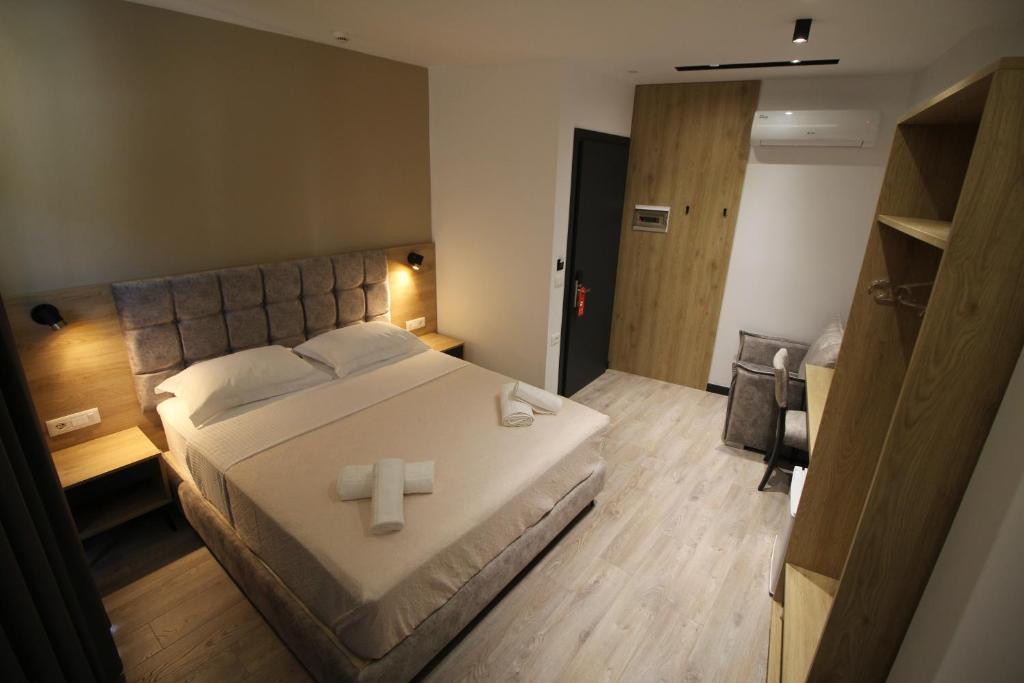 Postel nebo postele na pokoji v ubytování F&J Hotel