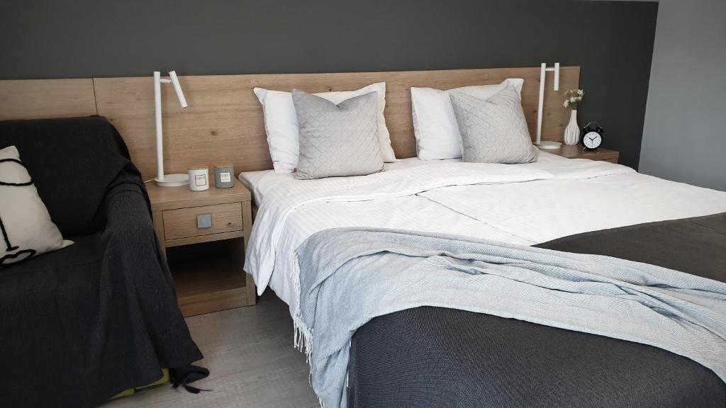 Posteľ alebo postele v izbe v ubytovaní Rezydencja Pod Ochorowiczówką B&B