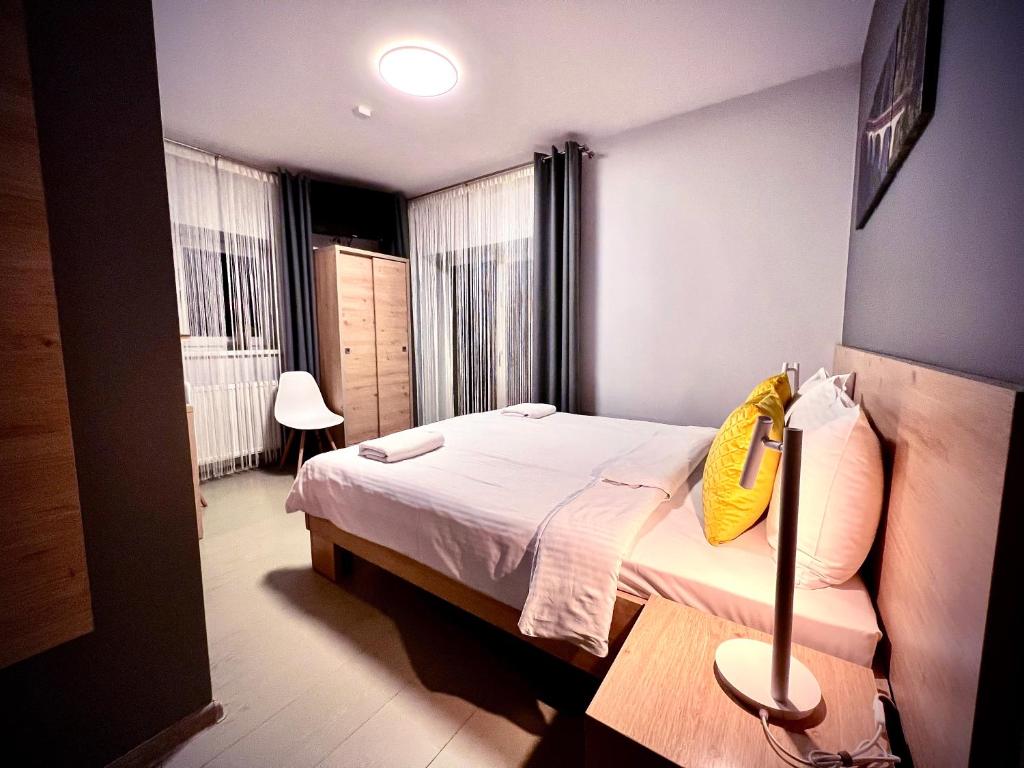 Posteľ alebo postele v izbe v ubytovaní Rezydencja Pod Ochorowiczówką B&B
